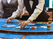 How does session tier affect crypto roulette access?